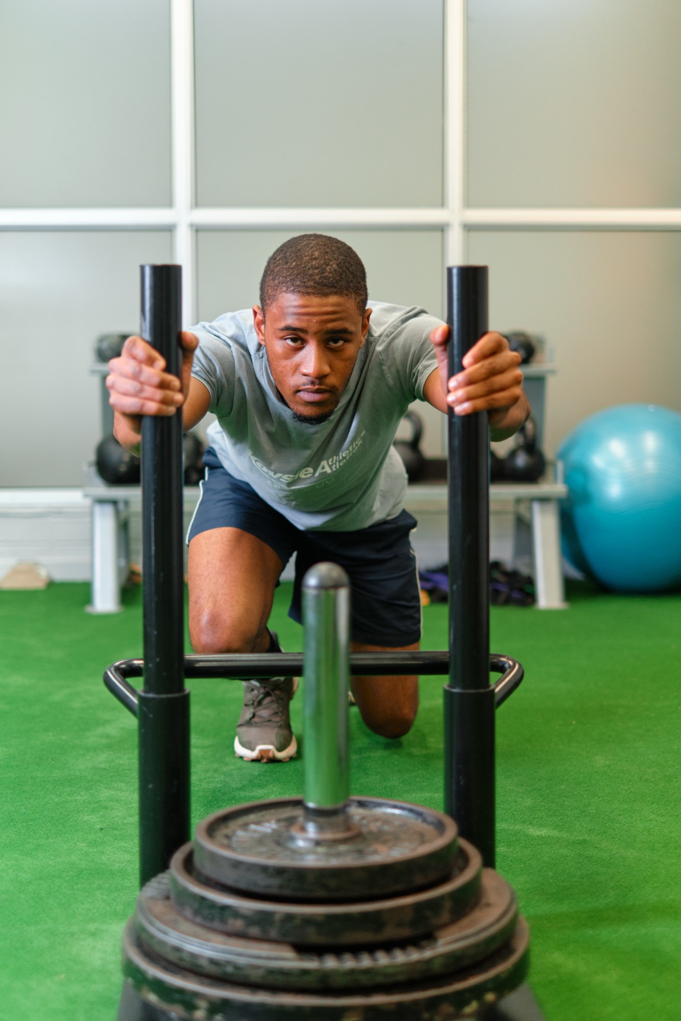 student doing strength training